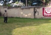 Plot for sale with some structures in Mbarara city centre